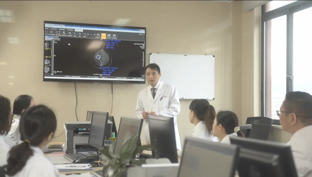 HYGEIA multidisciplinary team reviewing scans