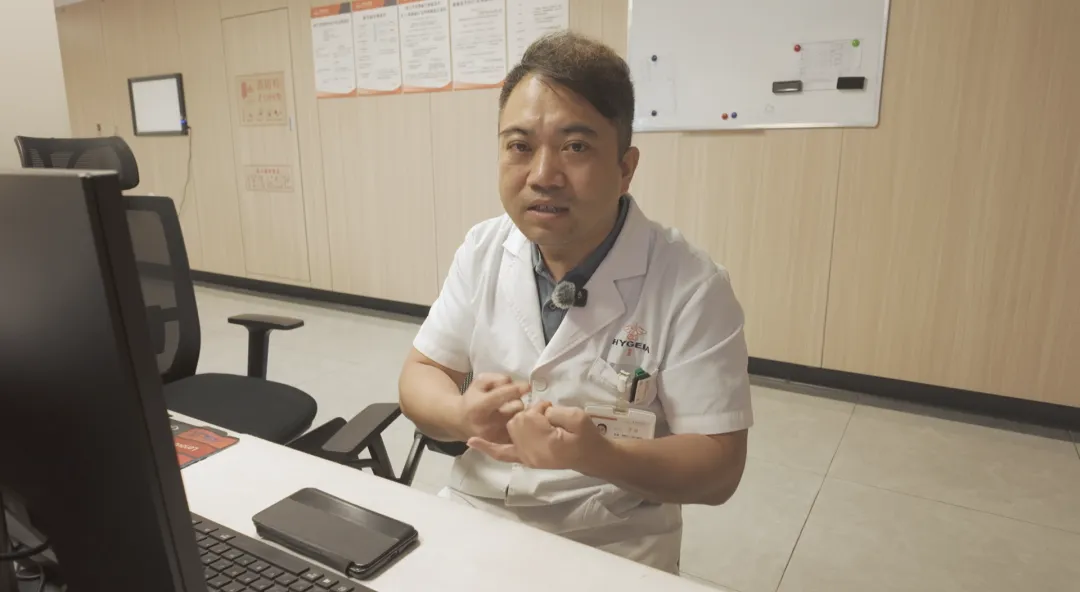 Dr. Luo Kuo speaking during an interview at Chongqing HYGEIA Hospital